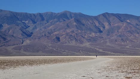 Tourist-Hiking-Alone-In-Death-Valley-National-Park-In-California