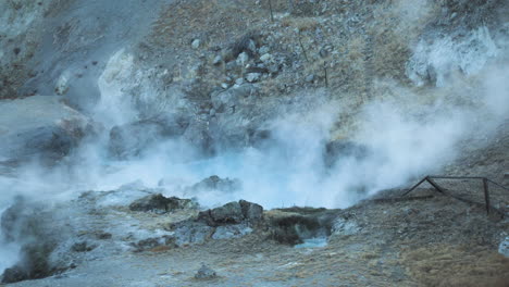 Steaming-from-Natural-Hot-Spring,-Hot-Creek-Geological-Site,-Califonia,-US,-Slow-Motion