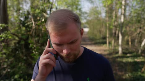 Angry-Phone-Call,-Man-Talks-on-Mobile-Phone-Outdoors,-Caucasian-Male