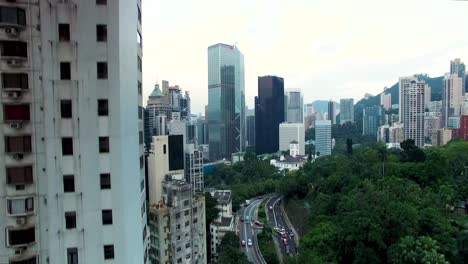 Luftaufnahme,-Zentrales-Hongkong,-Gebäude-In-Der-Innenstadt-Und-Wolkenkratzer-An-Bewölkten-Tag
