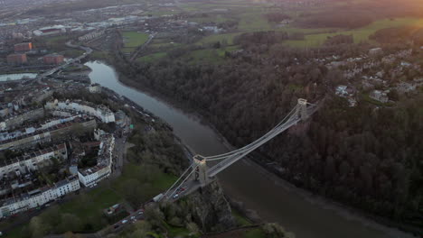 Aerial-shot-of-Clifton-suspension-bridge-in-the-city-of-Bristol-on-the-River-Avon-at-sunset