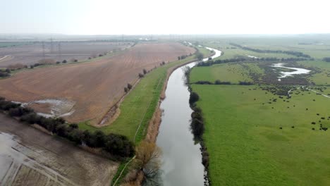 Aerial-drone-shot-of-the-River-Stour-in-Kent,-England
