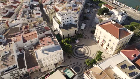 Unique-geometrical-design-created-with-Portuguese-pavement,-calcada-portuguesa,-Gil-Eanes-square,-Lagos,-Algarve