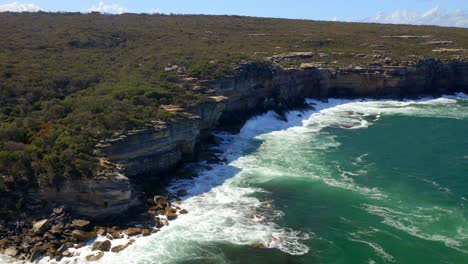 Cliff-Seafront-Coastline-And-Heathland-In-Royal-National-Park-On-Summer-Day-In-Sydney,-NSW,-Australia
