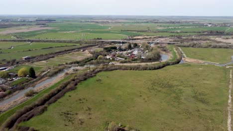 Panning-aerial-drone-shot-of-the-River-Stour-in-Kent,-England