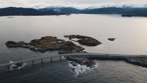 Coastal-Scenery-With-Car-Driving-Runs-Through-An-Archipelago-At-Atlantic-Road-In-The-County-Of-Norway