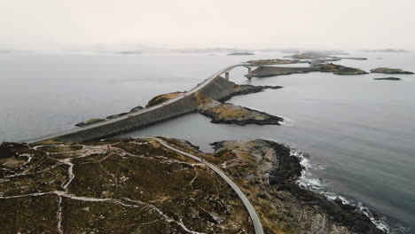 Storseisundet-Bridge-And-Atlantic-Ocean-Road-During-Snowfall-In-Norway