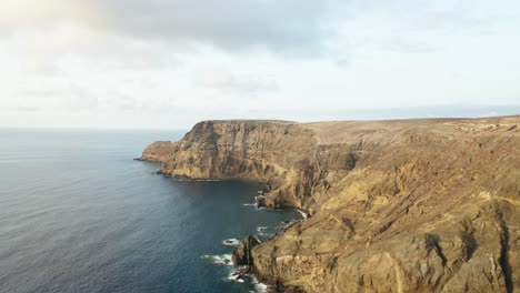 Scenic-coastal-landscape-of-volcanic-island-in-Atlantic-Ocean,-sunset