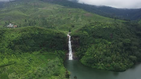 Aerial-at-lower-Gartmore-Falls-flowing-into-Maussakelle-Reservoir,-Sri-Lanka