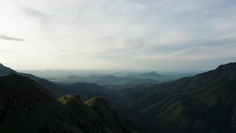 Bright-sunrise-at-Little-Adams-Peak-in-Sri-Lanka,-Aerial