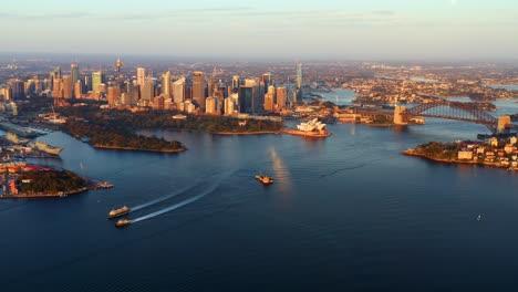 Panning-Aerial-View-of-Sydney-CBD-with-Ferry-Ships-cruising-in-Early-Morning