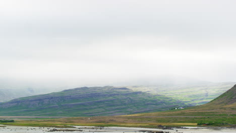 Pan-right-shot-of-the-Westfjords-area-during-a-bright-morning