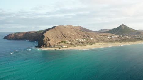 Porto-Santo-island-with-beautiful-beach-and-tropical-azure-water,-aerial