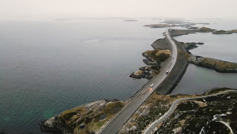 Aerial-View-Of-Atlantic-Ocean-Road-On-A-Foggy-Day-In-Norway