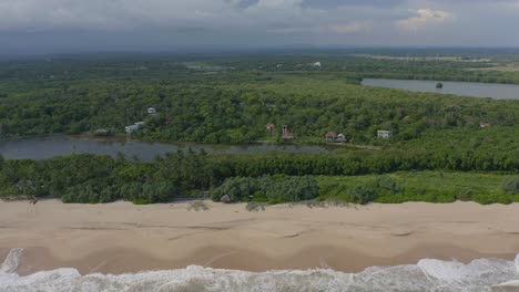 Aerial-of-pristine-Tangalle-beach-with-waves-on-tropical-coast-of-Sri-Lanka