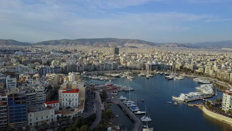 Aerial-drone-shot-from-Piraeus-looking-back-at-rest-of-Athens-Greece,-4K