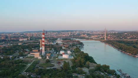 Aerial-truck-shot-over-a-powerplant-in-Belgrade,-Serbia-during-the-afternoon