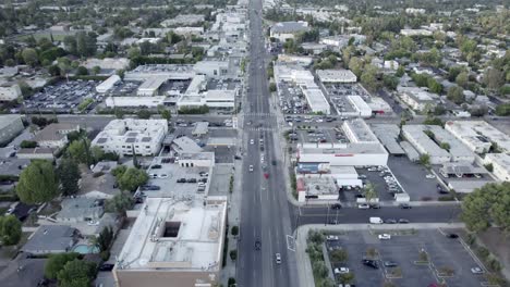 Aerial-view-down-Van-Nuys-boulevard-traffic-in-San-Fernando-valley-region-cityscape