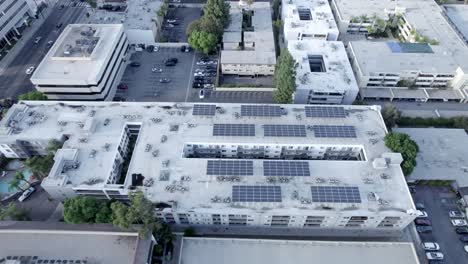 Aerial-view-rising-above-Sherman-Oaks-Encore-apartments-solar-roof-panels-community-accommodation