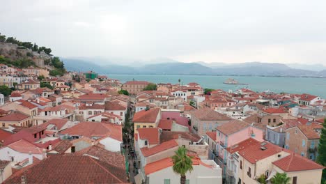 Close-up-shot-of-Nafplion-city-streets,-tile-roofs-and-white-buildings