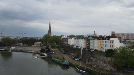 Terrance-of-colourful-houses-on-riverside-in-Bristol-city-centre-drone-footage