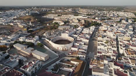 Aerial-Orbiting-Ayamonte-cityscape-white-houses-sprawling,-Guadiana-river---Huelva