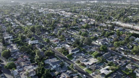 Neighborhood-of-homes,-City-of-Van-Nuys,-real-estate-of-house,-aerial-in-day