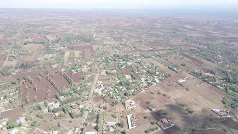 Vista-Panorámica-Aérea-De-La-Zona-De-La-Aldea-Rural-Y-El-Campo-De-Cultivo-De-Kenia