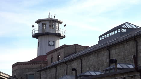 Penitentiary-guard-tower-and-cellblock-with-multiple-skylights