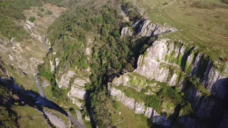 Tilt-down-aerial-View-Over-Limestone-Valley-Of-Cheddar-Gorge