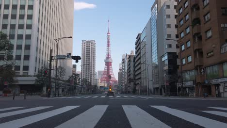 POV-to-the-Tokyo-tower,-iconic-building-in-the-Japan-with-some-traffic