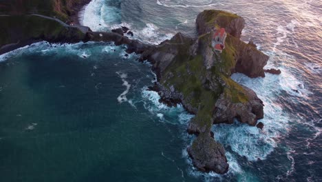 Aerial-view-of-Gaztelugatxe-hermitage-in-Basque-Country-Spain,-rock-castle-dedicated-to-John-the-Baptist