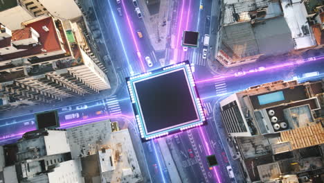 Aerial-top-down-of-traffic-on-road-fork-in-digital-city-with-landing-Microchip-on-junction---Future-Concept-with-glowing-connection-lines---Hologram-motion-graphic-in-downtown