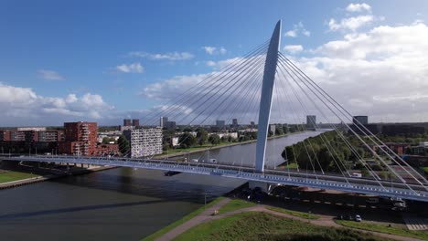 Cars-and-bikes-passing-over-and-under-the-Prins-Clausbrug-cable-bridge-city-access-to-Utrecht-residential-neighbourhood-Kanaleneiland