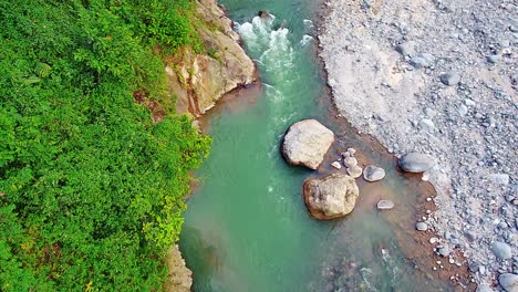 the-river-that-flows-between-the-rocks-of-the-mountains