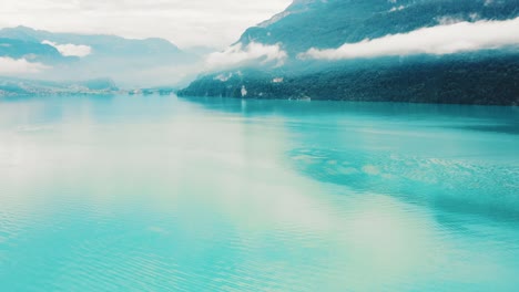 Clear-blue-waters-of-Lake-Thun-on-a-cloudy-summer's-day