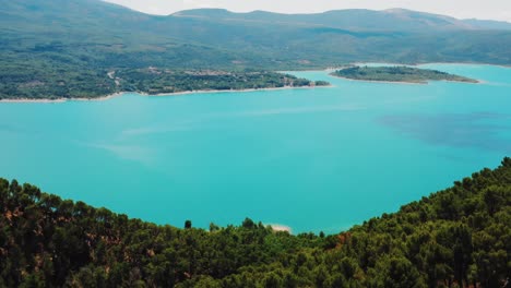 Aerial-view-revealing-beautiful-blue-waters-of-the-Gorges-du-Verdon