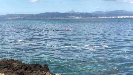 Person-Snorkeling-At-Bella-Vista,-Mallorca,-Spain