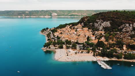 Moving-aerial-view-of-a-sleep-town-beside-the-Gorges-du-Verdon