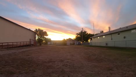 TIMELAPSE---Between-two-buildings-during-dawn-as-the-sun-goes-down-in-a-small-town-in-Empress-Alberta-Canada
