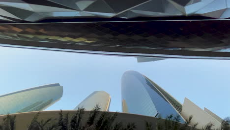 Looking-up-skyscrapers-when-riding-underneath-in-slow-motion