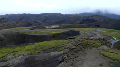 Drone-aerial-footage-of-river-system-in-a-valley-in-the-Icelandic-highlands-in-Iceland-near-landmannalaugar