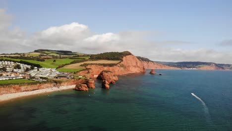 Panning-Right-Horizontal-shot-of-Lyme-Bay-looking-towards-Sidmouth,-Devon,-England-UK