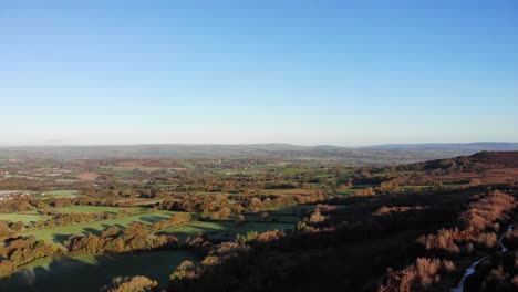 Aerial-rotating-view-looking-over-the-Culm-Valley-from-Culmstock-Beacon,-Devon,-England