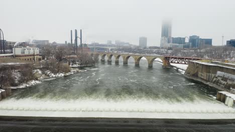 View-from-Above-Saint-Anthony-Falls,-Minneapolis-on-Cold-Foggy-Day