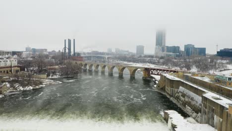View-from-Above-Saint-Anthony-Falls,-Minneapolis-on-Cold-Foggy-Day