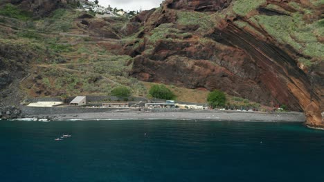 Perfect-blue-water-at-secluded-volcanic-beach-of-Garajau-in-Madeira