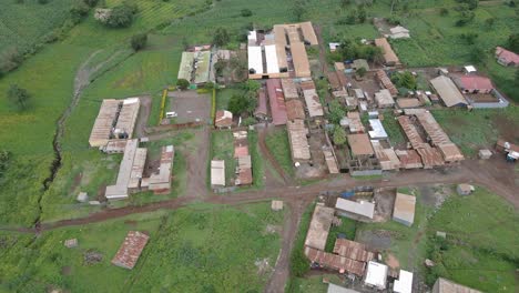 Bird's-Eye-View-Of-Old-Structures-And-Houses-In-The-Rural-Town-Of-Loitokitok-In-Kajiado-County,-Kenya---aerial-drone-shot