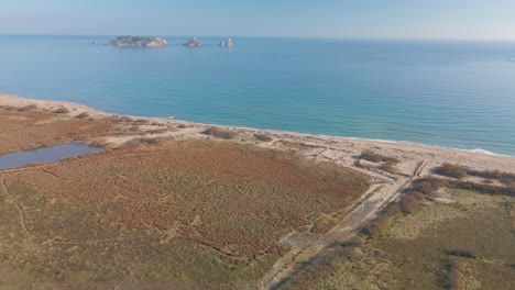 Aerial-Images-With-Drone-Of-The-Medes-Islands-In-Catalunya-Costa-Brava-European-Tourism-Empty-Beach-Of-Begur-The-Gola-Del-Ter-Mouth-Of-The-River-Aiguamolls-Del-Baix-Emporda