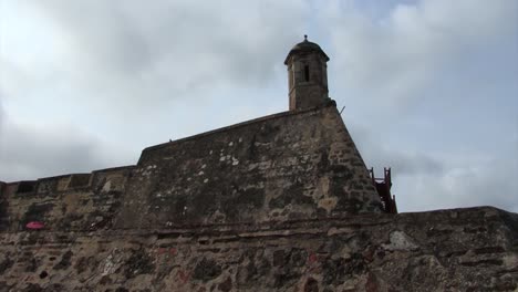 Walls-of-Castillo-de-San-Felipe-de-Barajas-and-the-watchtower,-Cartagena,-Colombia